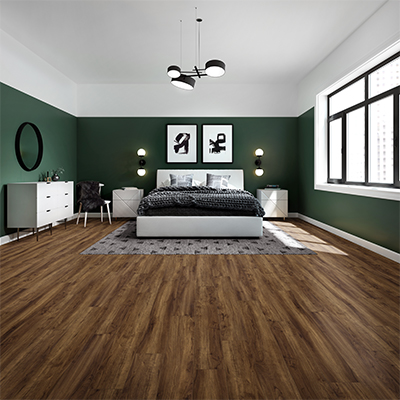 area rug in bedroom with hardwood floors