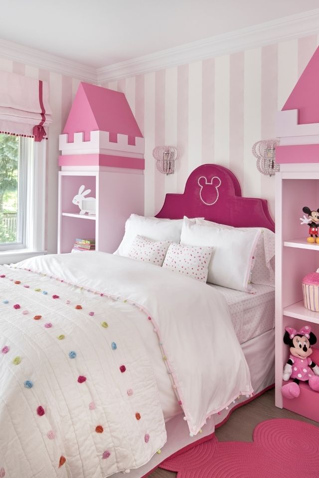 Pink kid's bedroom with built-in cabinets by Sara Bederman
